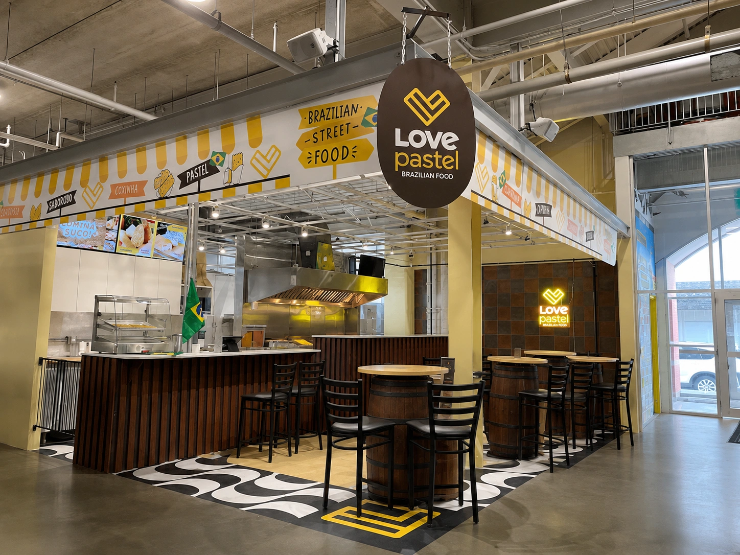 Love Pastel Brazilian Food takeout counter and seating inside Covent Garden Market in downtown London, Ontario